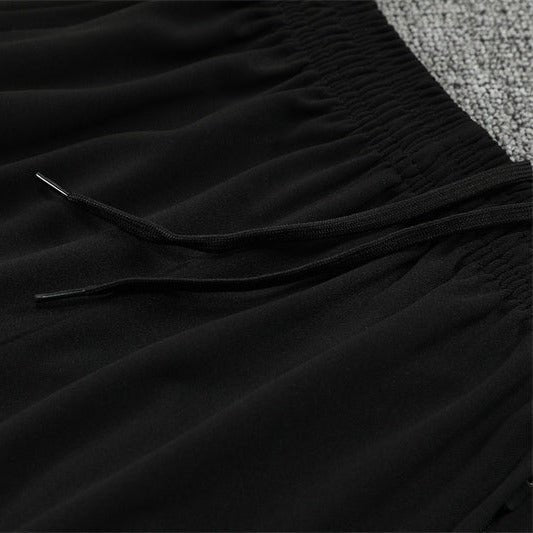 25/26 Manchester United Training Black Tracksuit - Premium Quality Kits at Football Monarch