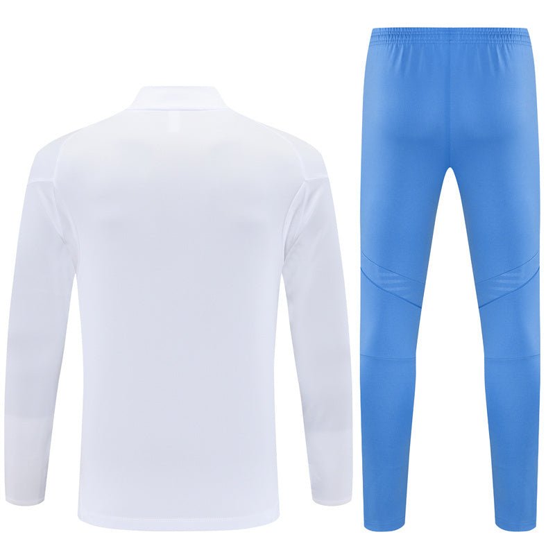 25/26 Real Madrid Training White/Light Blue Tracksuit - Premium Quality Kits at Football Monarch