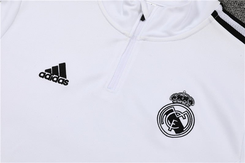 Real Madrid "Momentum" Premium Tracksuit - Premium Quality Kits at Football Monarch