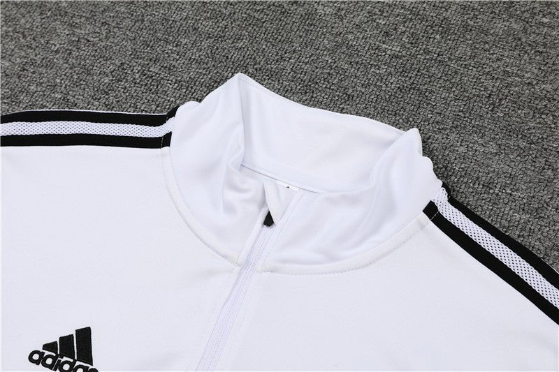 Real Madrid "Momentum" Premium Tracksuit - Premium Quality Kits at Football Monarch