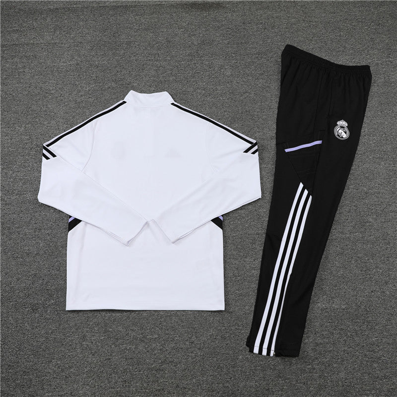 Real Madrid "Momentum" Premium Tracksuit - Premium Quality Kits at Football Monarch